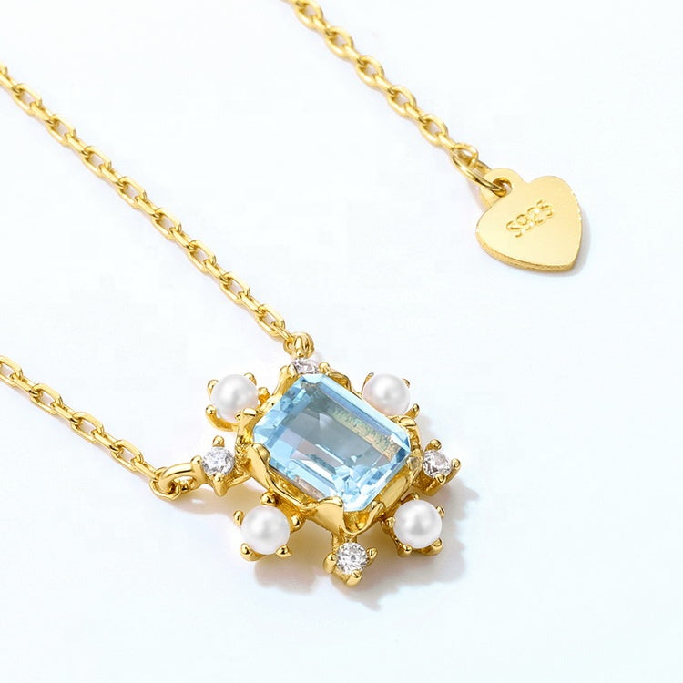 Blue Topaz Emerald Cut Pendant Necklace