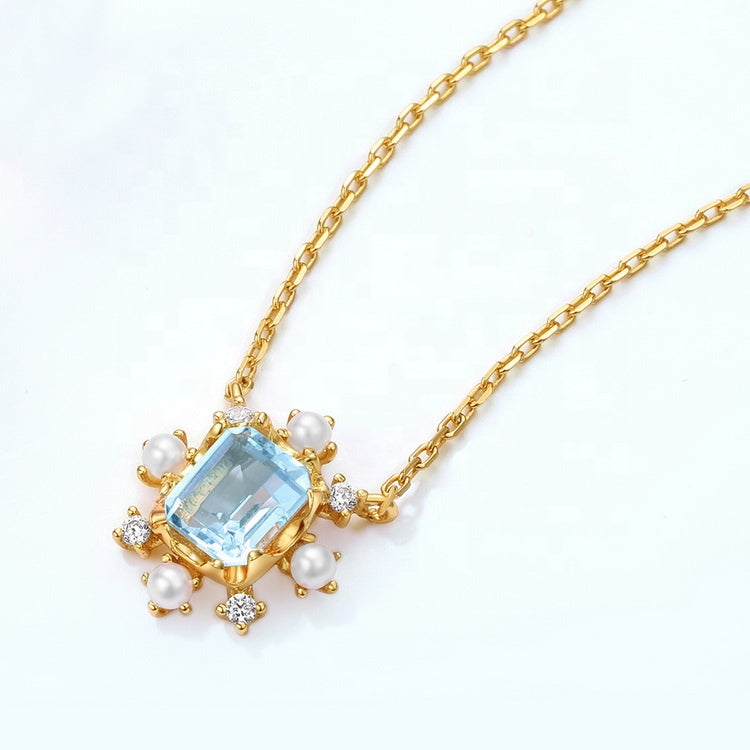 Blue Topaz Emerald Cut Pendant Necklace